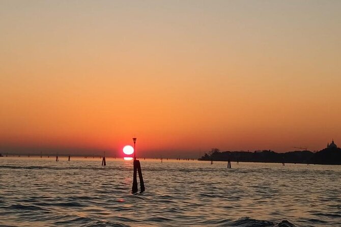 Aperitif at sunset in the Venice lagoon on a private boat. - Isola delle Vignole: Venice’s old holiday island feel