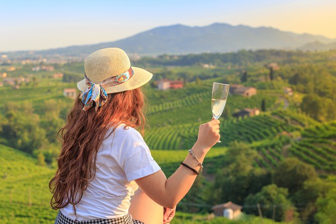 Premium Prosecco Hills Winery Tour with Prosecco Tastings & Food - Food pairing: cold cuts, cheese, bread, and breadsticks from small producers