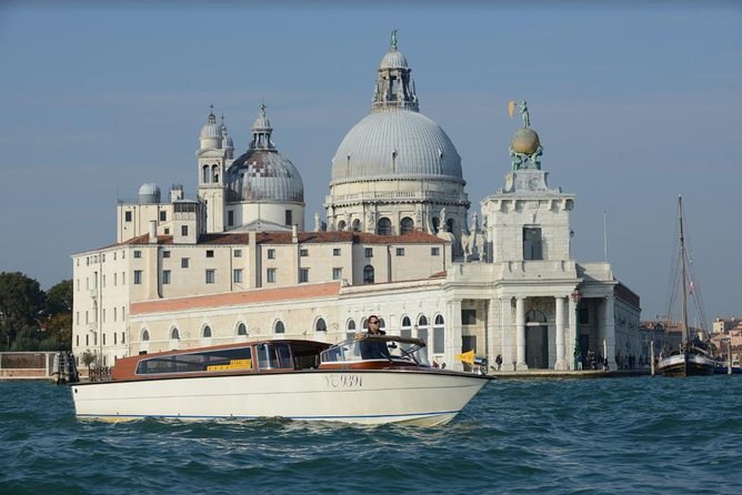 Private Arrival Transfer: Venice Train or Bus Stations to Venice Hotels - The water taxi ride: quick canal time, with air-conditioned comfort