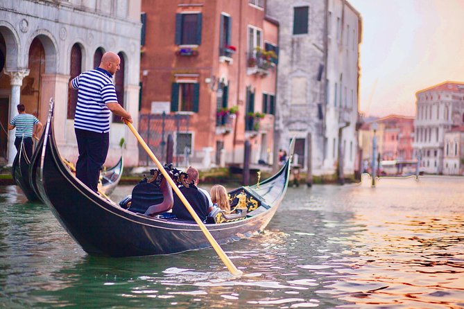 Private Gondola Ride in Venice - Gondoliers and atmosphere: banter, phone calls, and singing (don’t bank on it)
