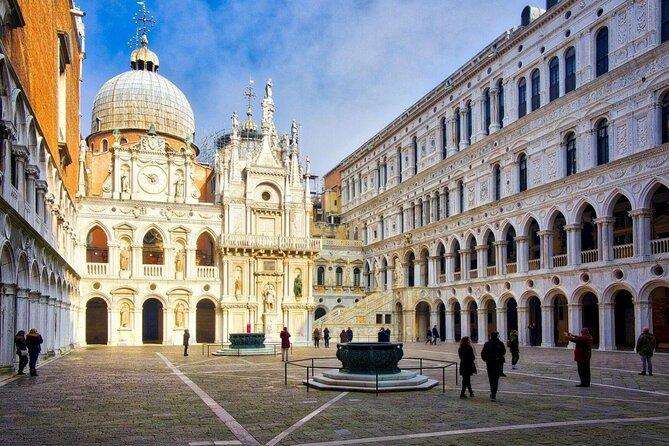 Private Tour: Venice Walk, Gondola, and Private Boat Tour ending on Murano Island with Venetian Lunch and Glass Factory Visit - Rialto and the Grand Canal gondola: the water level of Venice