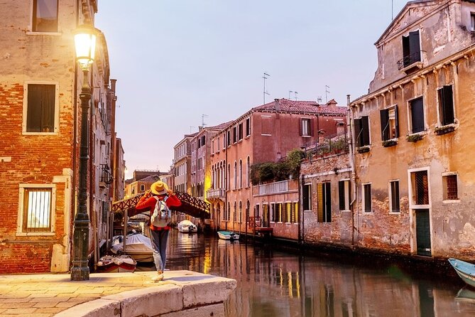 Private Venice Tour with a Local, Highlights & Hidden Gems, 100% Personalised - The last remaining bridge without railings: a rare Venice photo moment