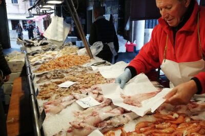 Rialto Market & Seafood Cooking Class in Murano - Choosing your fish and crossing the Canal Grande by gondola ferry