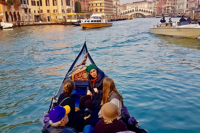 Venice: 30 min private Gondola Ride with Guide - Entering Venice by water, with a guide doing the talking