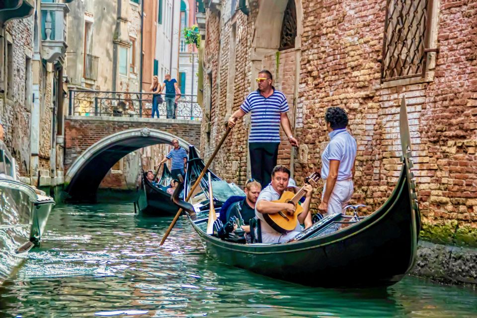 Venice: 30-Minute Gondola Ride on Grand Canal with Serenade - Stop-by-stop: Santa Maria della Salute to Punta della Dogana