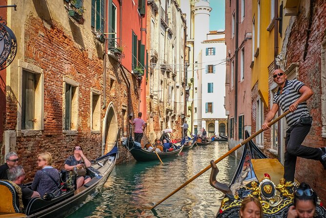 Venice: Classic 30-Minute Gondola Ride Through the Canals - Fenice, Dogana views, and the Manin area from the water