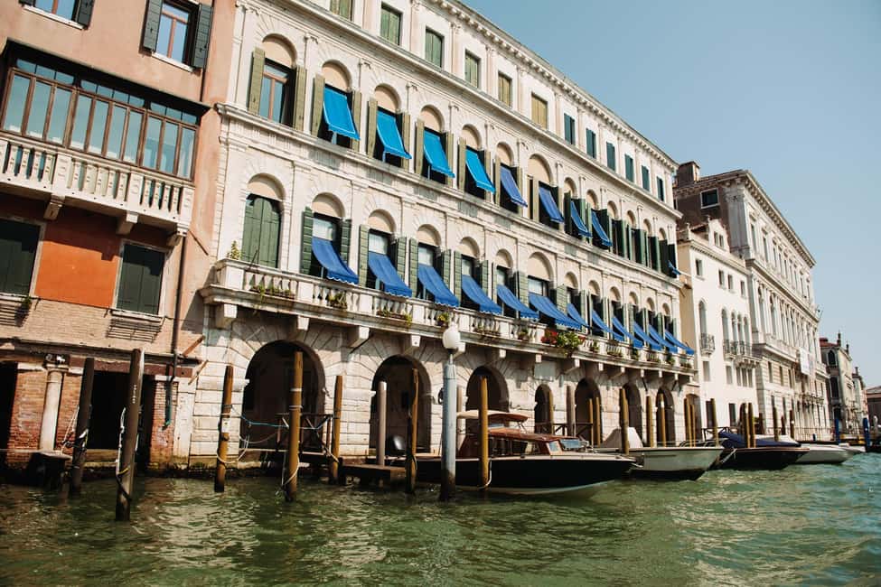 Venice: Grand Canal by Boat with Expert Guide - Rialto Bridge from the canal: classic, but in a way that hits harder