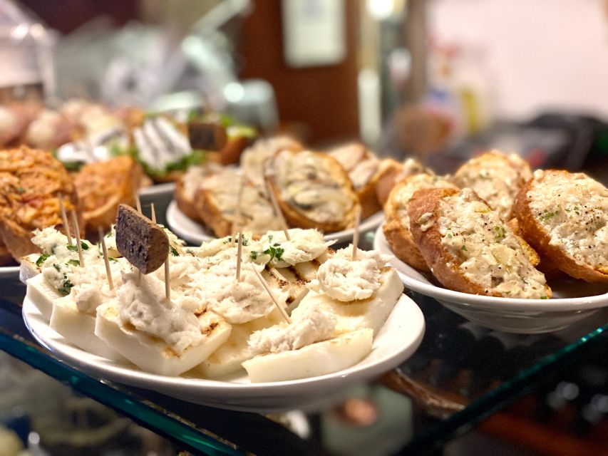 Venice: Guided City Highlights and Street Food Tour - Grand Canal and neighborhood highlights that feel grounded