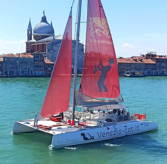 Venice: Lagoon Catamaran Tour with Classical Music & Drinks - A floating concert view of Venice’s lagoon