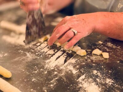 Venice: Pasta and Tiramisu Cooking Class with Wine - Entering the Dorsoduro restaurant: a calmer Venice moment