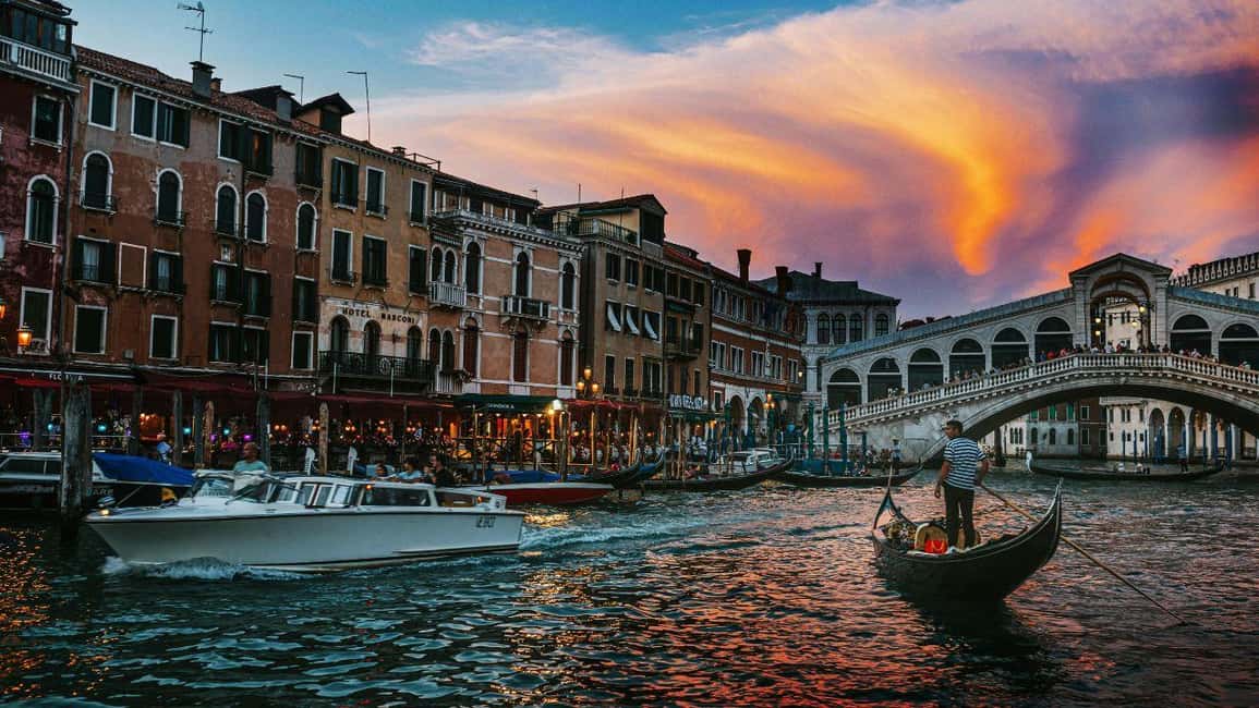 Venice: Shared Gondola Ride at Sunset - On the water: Grand Canal reflections and the quieter side-canals route