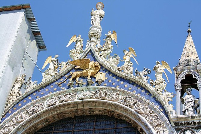 Venice Skip the line of San Mark Basilica and Doge's Palace Tour - St. Mark’s Basilica: domes with gold accents and the mix of styles
