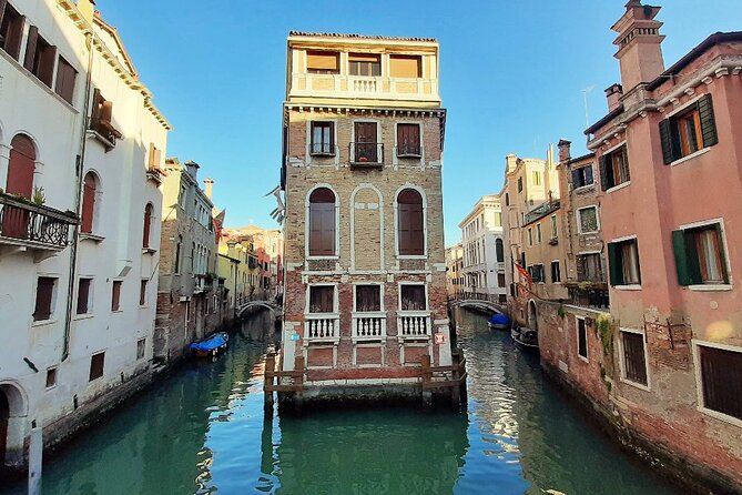 Walking Tour and Enchanting Gondola Journey in Venice - The stories woven in: theaters, figs, and place-name clues